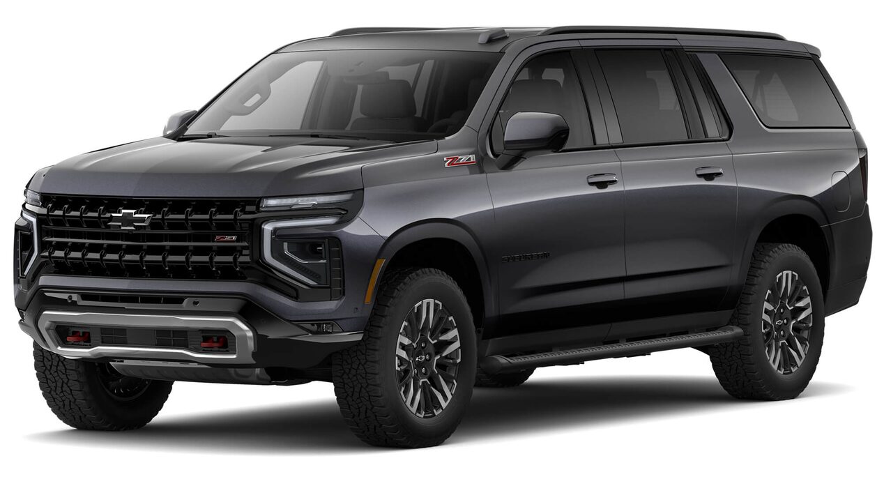 Vista lateral frontal de la Chevrolet Suburban Z71 2025 en color gris oscuro, ideal para mostrar diseño, parrilla y altura off-road
