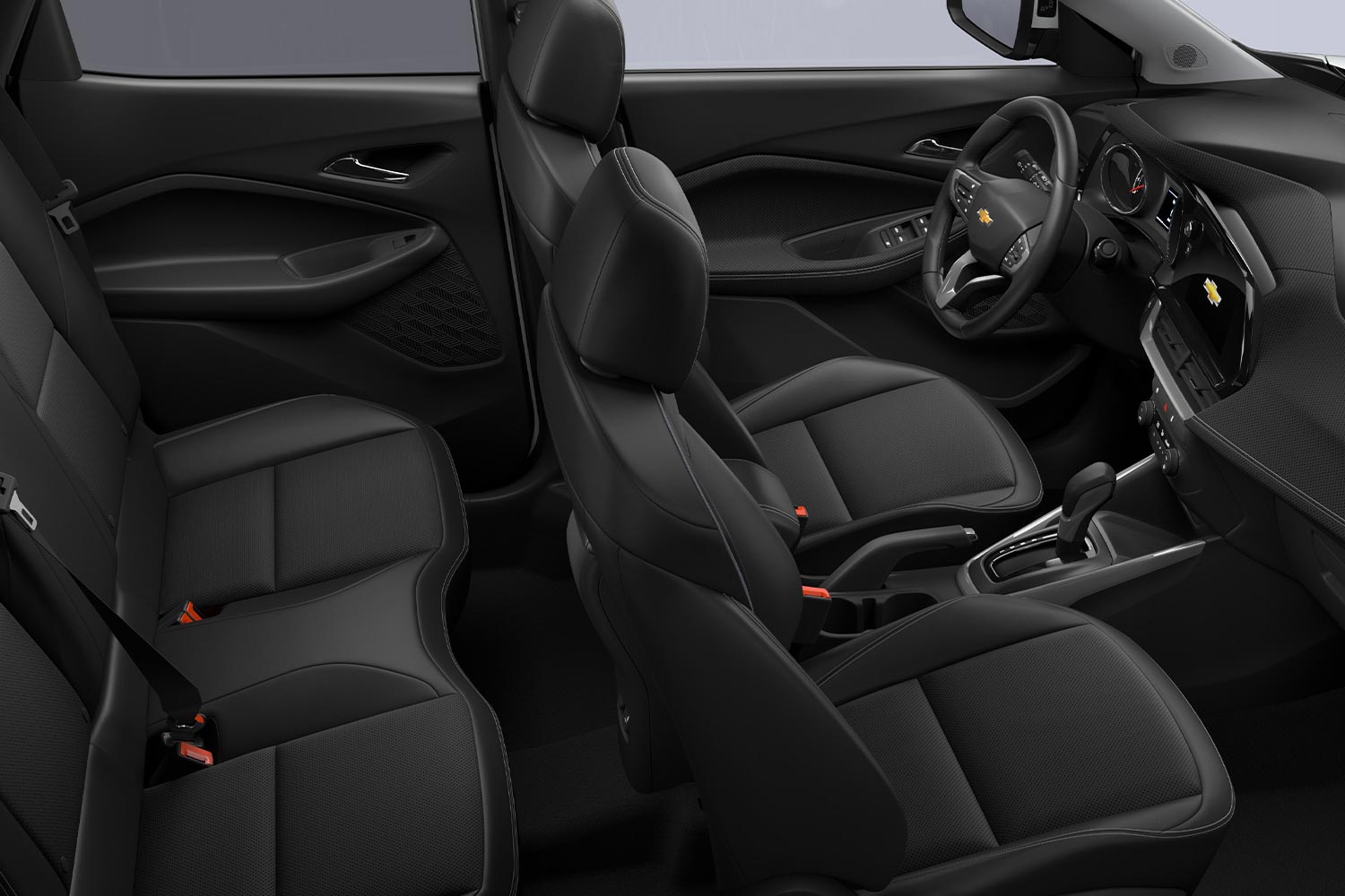 Vista completa del interior de la Chevrolet Montana mostrando asientos traseros y delanteros.