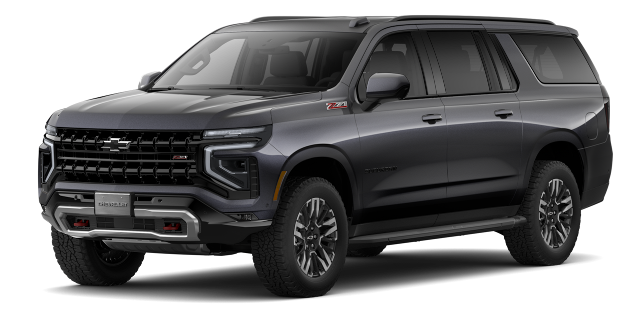 Vista frontal lateral de Chevrolet Suburban en color gris, SUV de gran tamaño del portafolio Chevrolet Mundo SUV 2025