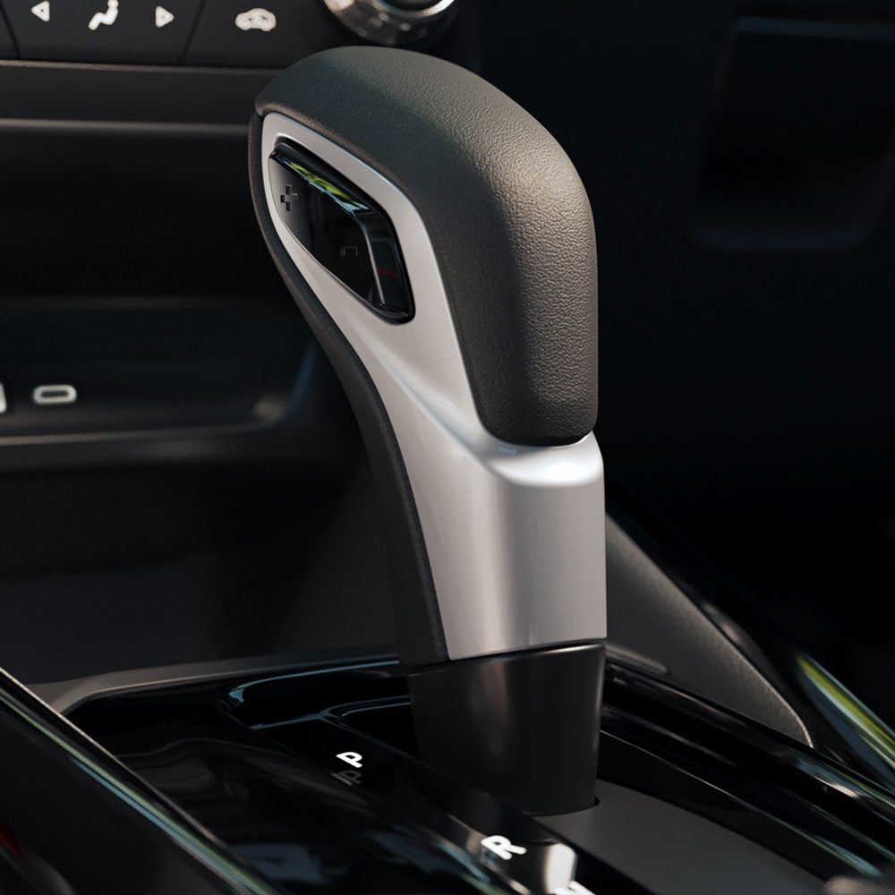 Vista en detalle de la palanca de cambios en la consola central de una Chevrolet Montana.