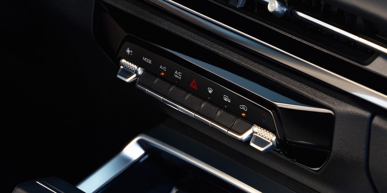 Controles del climatizador de la Chevrolet Groove.